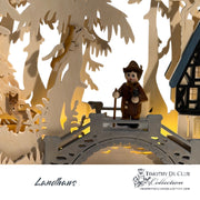 Landhaus Schwibbogen 699 wood cutout with illuminated forest scene and figure sitting by cottage.