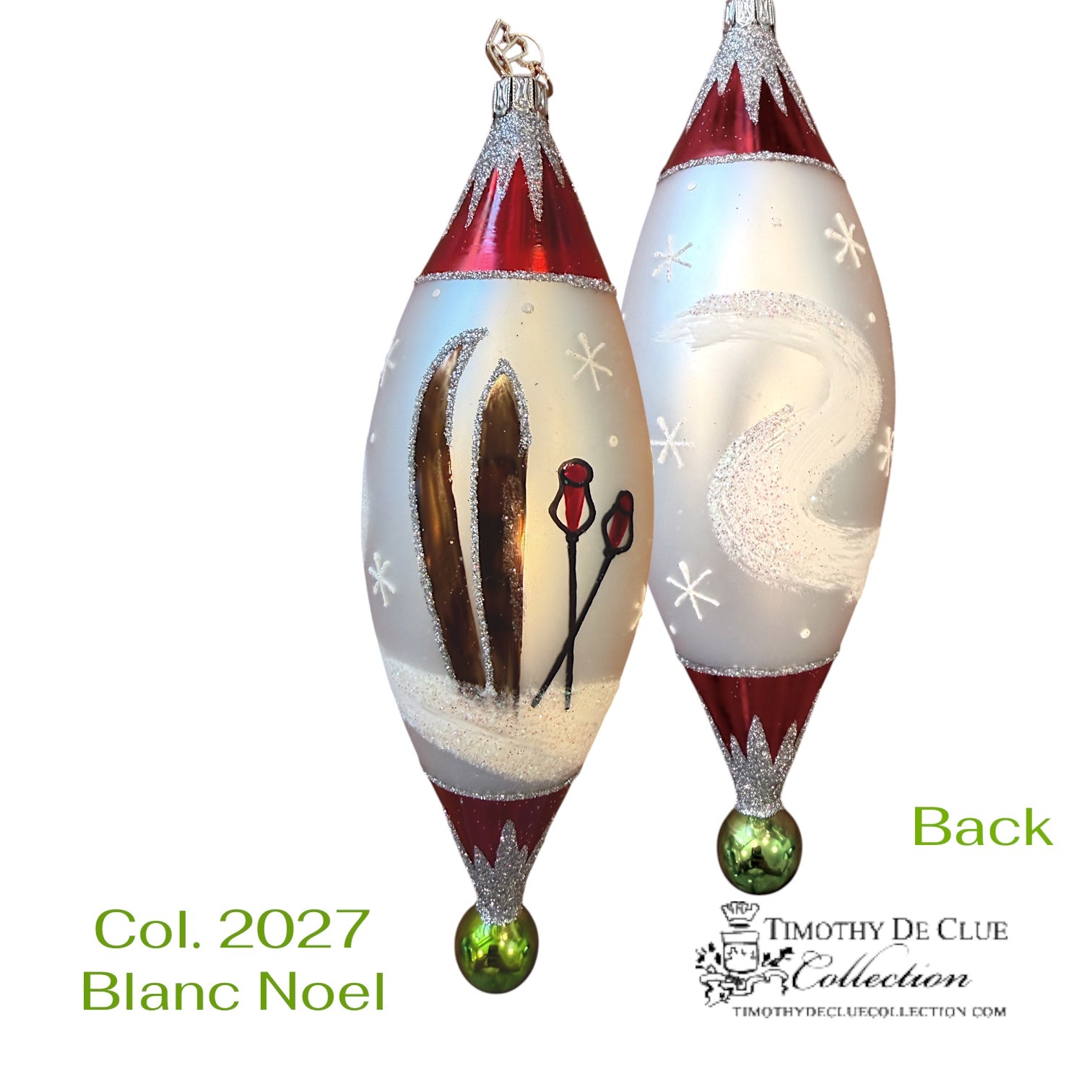 Blanc Noel German 2027 teardrop ornaments with red caps, cream bodies, snowflakes, and winter scenes, green bulb finials.