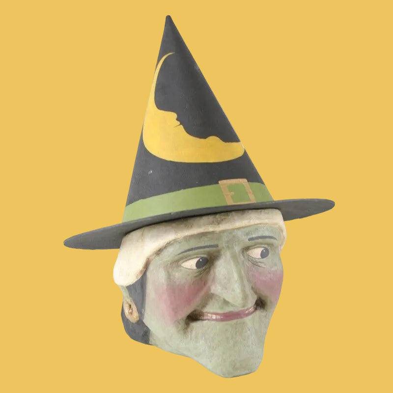 Vintage-style witch HALLOWEEN PAPER MACHE DECOR with a pointed hat on a white background