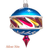 A handcrafted Christmas bauble with a blue upper section, featuring silver snowflake decorations and a multicolored striped pattern with a red lower section and a pointed red base.