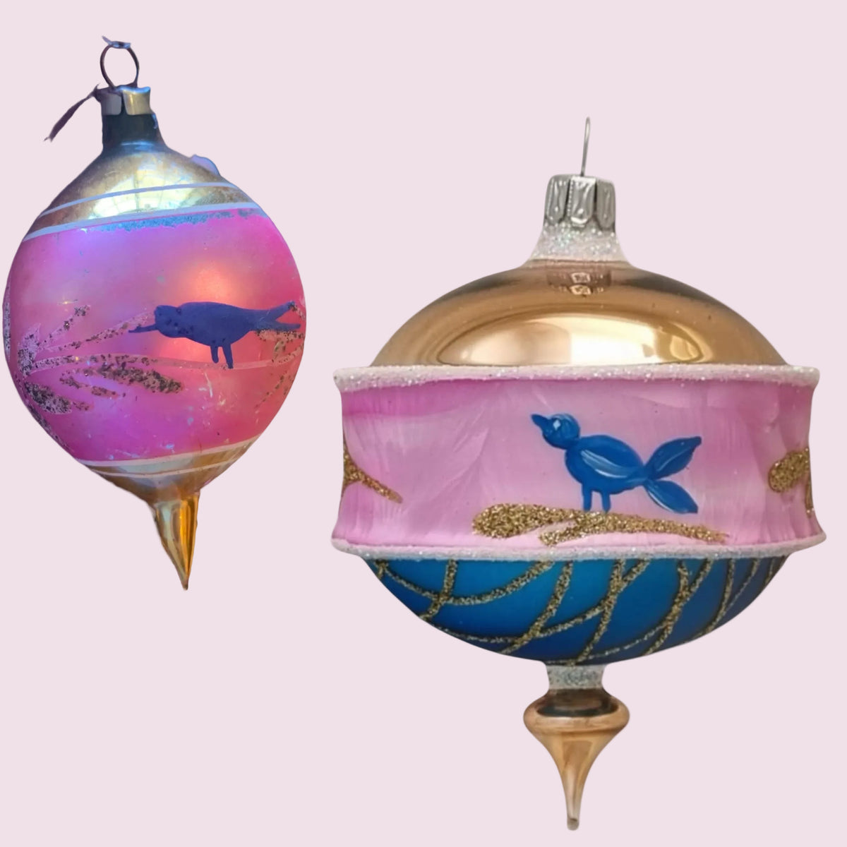 Bluebird Song 3.25 in Drop ornament with pink and blue glass, gold accents, and bird design