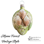 Alpine Forest Vintage Style glass ornament featuring three brown pinecones with green leaf details and silver accents