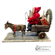 Donkey Cart Santa Candy Container with red coat pulling wooden sleigh filled with green trees and gifts
