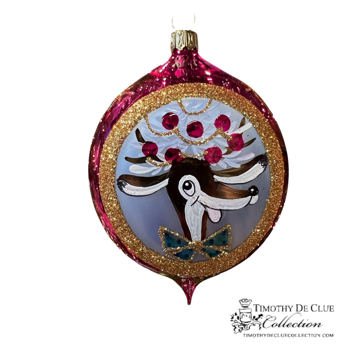 Dazzle Deer 3.25 in Tear Drop ornament, burgundy with gold glitter, featuring reindeer face and red berry tree design.