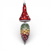Woodland Pilz Mushroom - German Christmas Collection

Bring a touch of enchanted forest magic to your tree with the Woodland Pilz Elder. Hand-blown and hand-painted in Germany, this whimsical ornament pairs a classic red toadstool cap with a sculpted pinecone body and a charming elder face inspired by European folklore. Frosted details and rich woodland colors give it a warm, nostalgic glow.

Made in Germany • Designed by Timothy De Cue