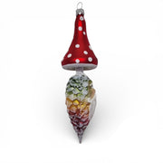 Woodland Pilz Mushroom - German Christmas Collection

Bring a touch of enchanted forest magic to your tree with the Woodland Pilz Elder. Hand-blown and hand-painted in Germany, this whimsical ornament pairs a classic red toadstool cap with a sculpted pinecone body and a charming elder face inspired by European folklore. Frosted details and rich woodland colors give it a warm, nostalgic glow.

Made in Germany • Designed by Timothy De Cue