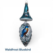 Mushroom top ornament with icy branches and oine cones, featuring bluebird on pine cone, vintage mold designed by Timothy De Clue