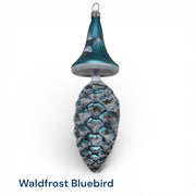 Mushroom top ornament with icy branches and oine cones, featuring bluebird on pine cone, vintage mold designed by Timothy De Clue
