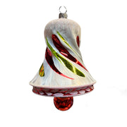 Decorative glass bell ornament with red and green swirls on a white background