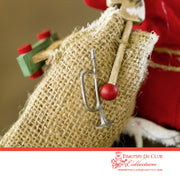 Driving Shoe Crazy Santa with burlap body, red pom-poms, and white fur trim details