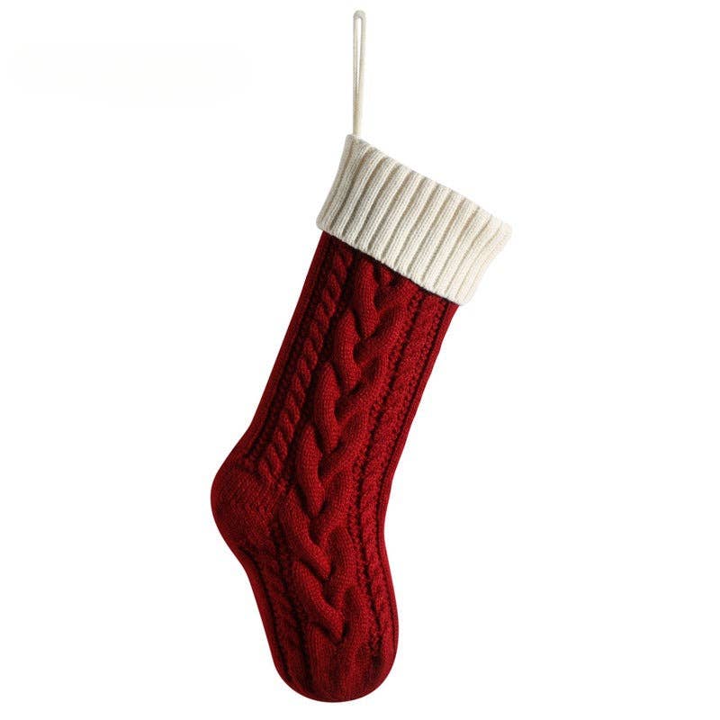 Knitted Wool Christmas Socks in red with white cuff and cable knit pattern, hanging loop attached