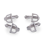 Bit Napkin Rings in brushed silver metal, shown as four-piece set from different angles