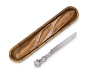 Baguette Board with Grape Bread Knife, wooden board and silver-handled serrated knife.