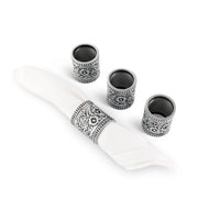 Concho Pattern Napkin Rings Set of 4 with white napkin and ring displayed on white background