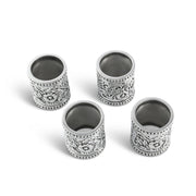 Concho Pattern Napkin Rings Set of 4 displayed in arrangement showing all four pieces from above
