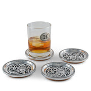Concho Western Drink Coaster Set of 4 with ornate silver designs and cork backing, displayed with whiskey glass.