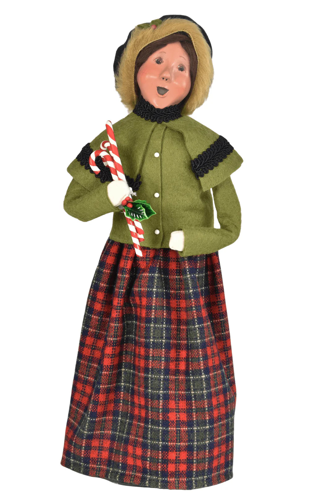 Byers Choice Caroler Candy Cane Family Lady in green wool coat with plaid skirt, holding striped candy cane decoration.
