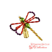 Dragonfly Rainbow De Clue Beaded Christmas ornament with red ribbon, green and gold beads, purple accents