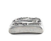 Black Forest Pewter Flask, side view showing curved base and embossed detail.