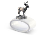 Deer Stoneware Napkin Ring with silver metal stag figurine on white ceramic base.