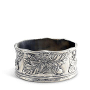 Acorn Oak & Leaf Pewter Wine Coaster, wide silver band with embossed grape and foliage relief, shown from above.