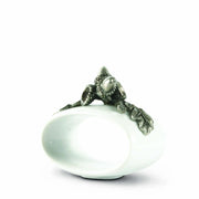 Acorn Stoneware Napkin Ring with green metal bird perched on white ceramic base