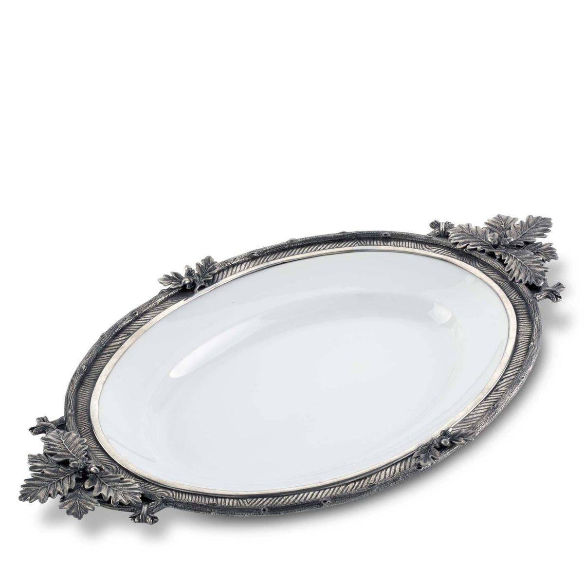 Black Forest Stoneware Tray with ornate metal rim and leaf handles, white ceramic center, oval shape