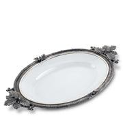 Black Forest Stoneware Tray with ornate metal rim and leaf handles, white ceramic center, oval shape