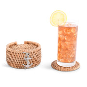 Anchor Hand Woven Wicker Rattan Coaster Set with beverage glass and lemon slice on white background