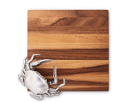 Crab Cheese Board with white metal crab handle on striped wood surface.
