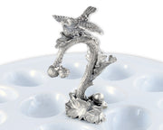 Deviled Egg Tray with Pewter Song Bird Handle, white ceramic base with silver perched bird figurine on branch.