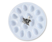 Deviled Egg Tray with Pewter Song Bird Handle, white ceramic round platter with oval indentations and silver bird accent in center