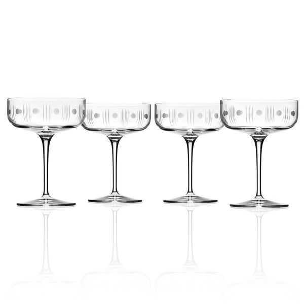 Lot - A SET OF SIXTEEN MID-CENTURY MODERN CHAMPAGNE FLUTES AND RED